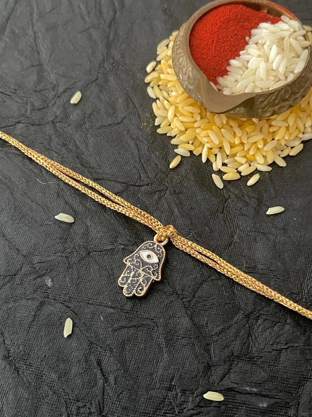 Designer Rakhi Black Evil Eye Hamsa Golden Thread Rakhi For Raksha Bandhan