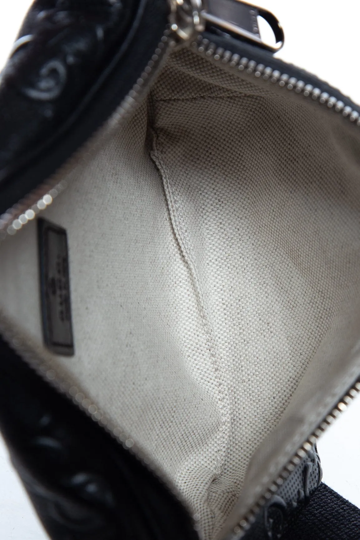 Gucci Black GG Embossed Perforated Belt Bag