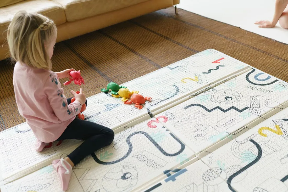 Tapis d'éveil pliable et réversible Baby Gym