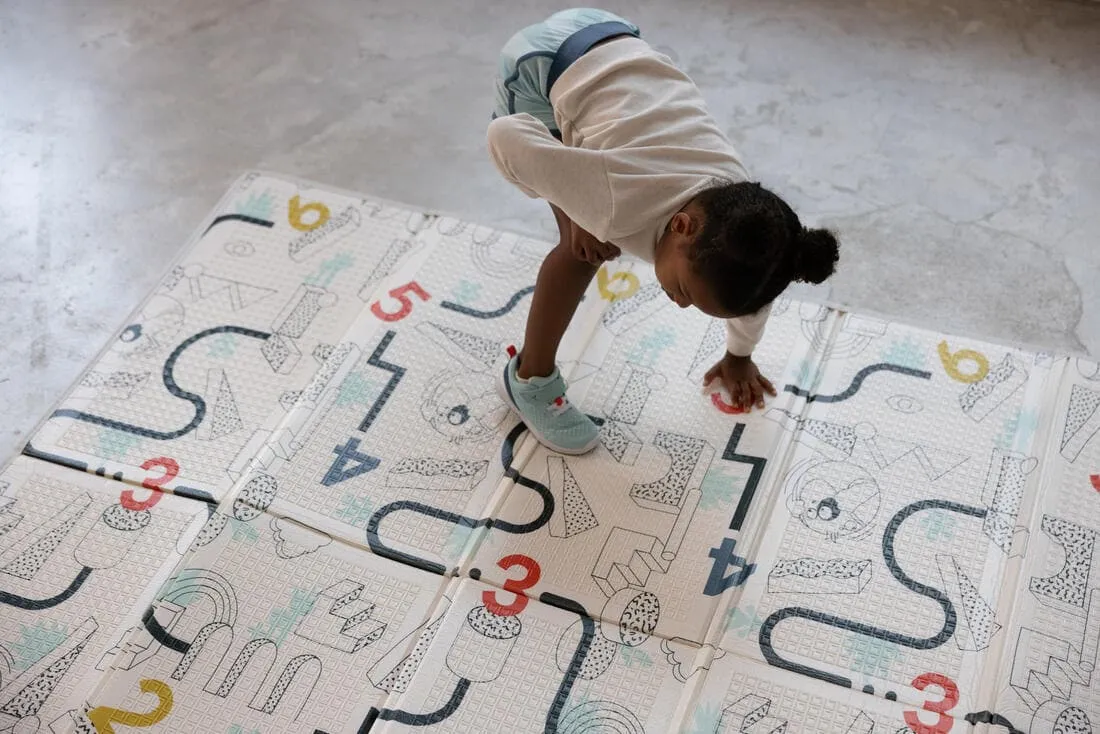 Tapis d'éveil pliable et réversible Baby Gym