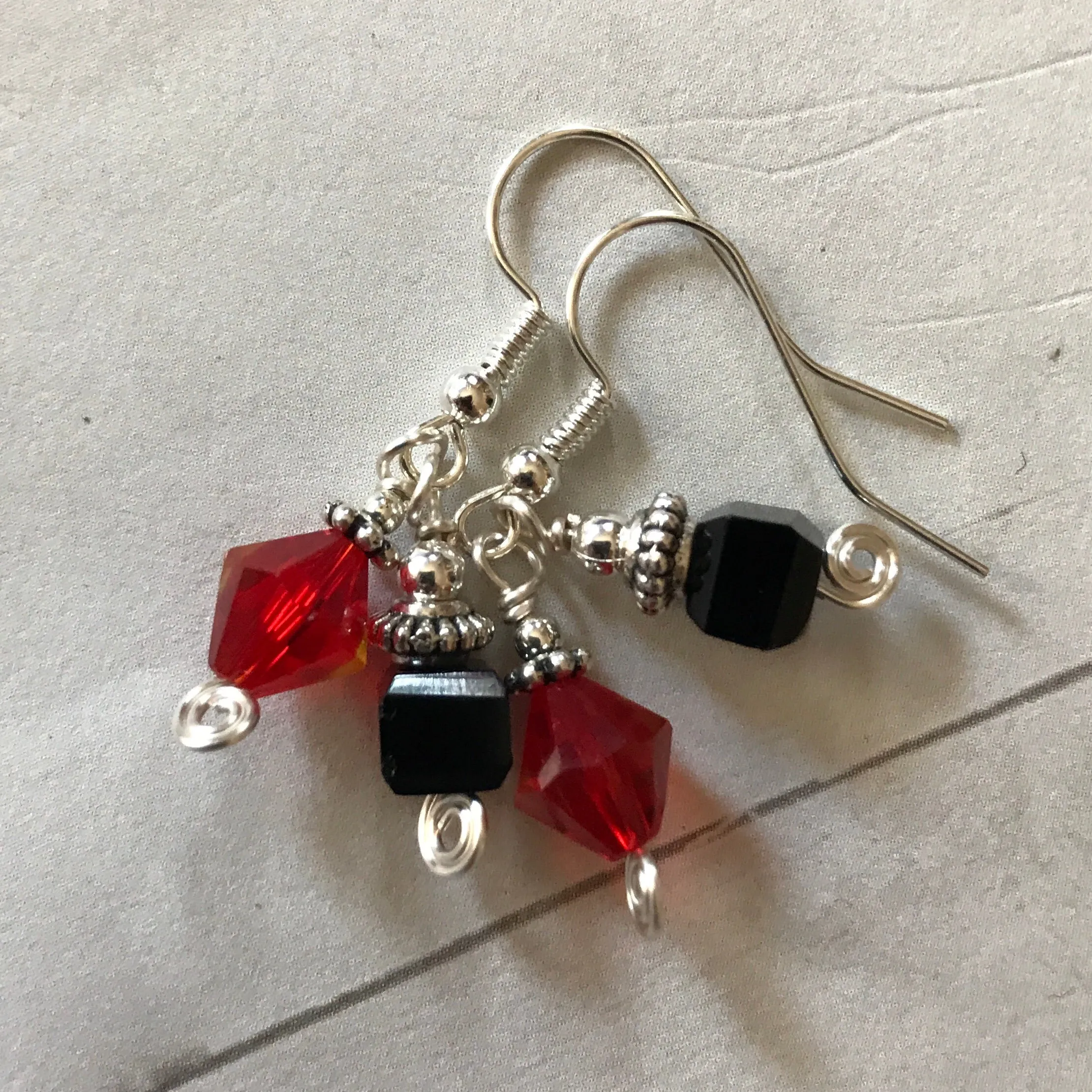 Tiny Evil Genius Earrings: red and black